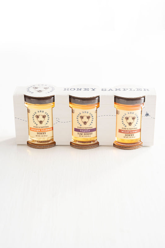 The Southern Sample Set includes 3 ounce jars of Georgia Wildflower Honey, Florida Orange Blossom Honey, and Tupelo Honey.
