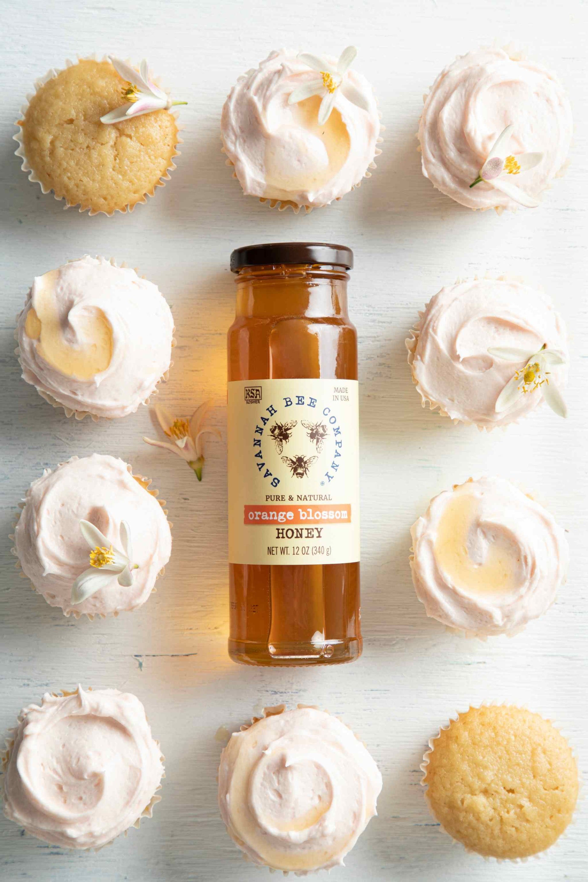 One Bowl Orange Blossom Honey Cupcakes with a 12 ounce orange blossom honey in the center.