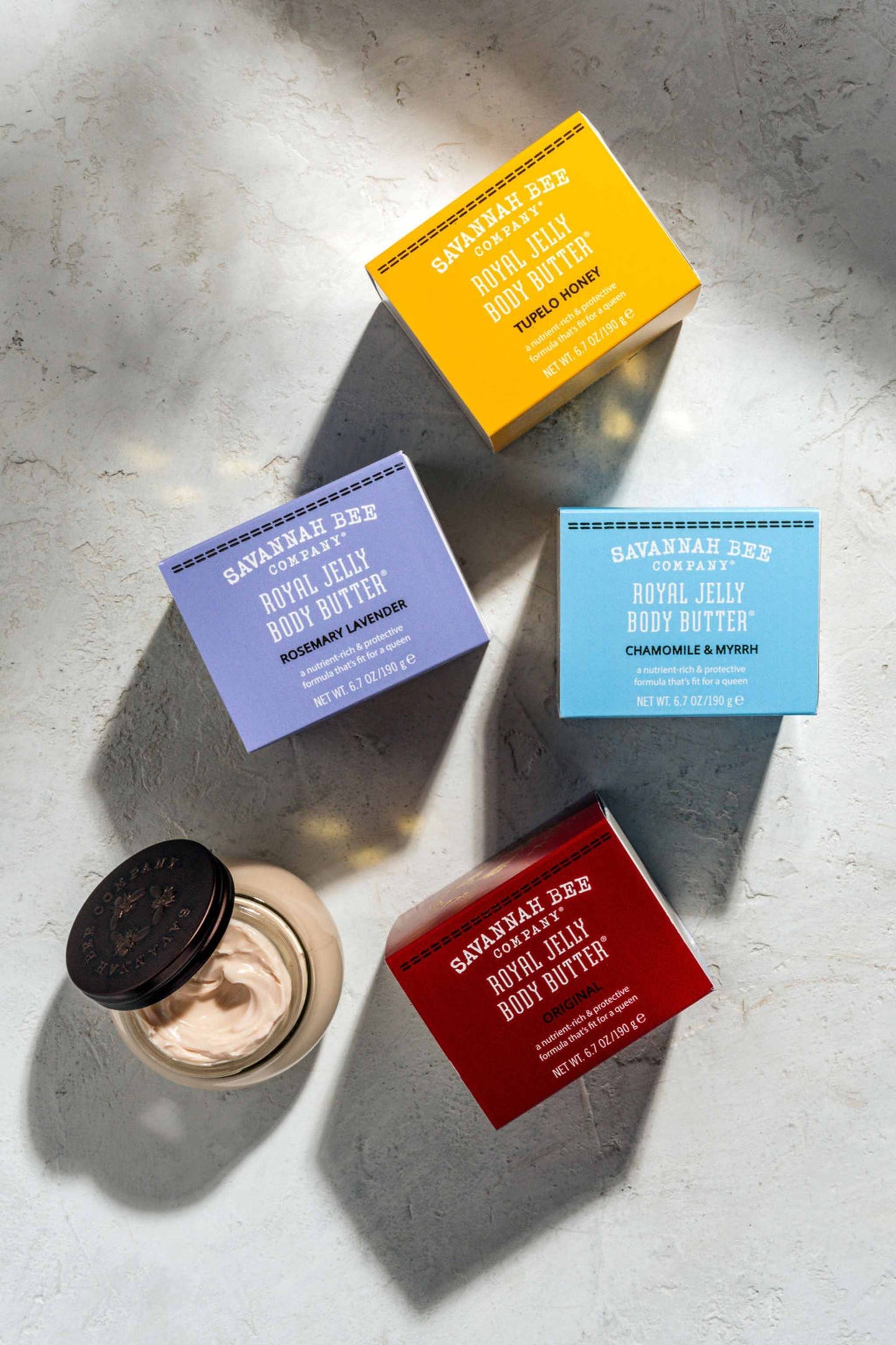 Queen Bee Body Butter Gift Set includes all four Royal Jelly Body Butters in Tueplo Honey, Rosemary Lavender, Chamomile and Myrrh and Original Fragrances 