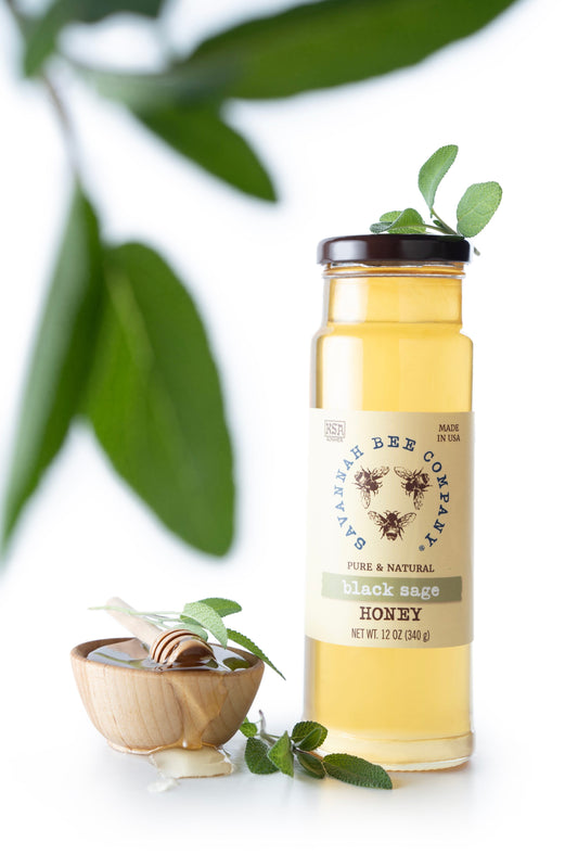 12 ounce black sage honey with sprigs of black sage.