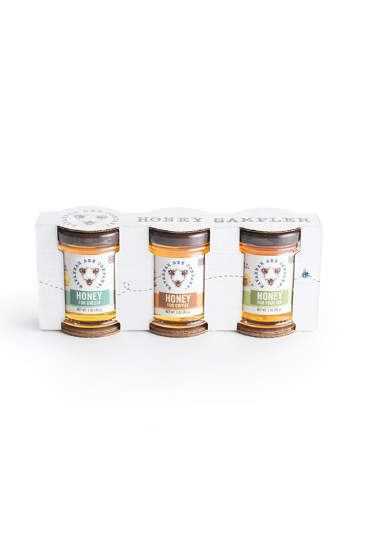 3oz honey for cheese, 3oz honey for coffee, 3oz honey for tea in a honey sample cardboard wrap, front facing